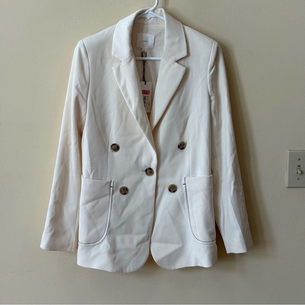 A Lives A Double Breast Style Cream Blazer